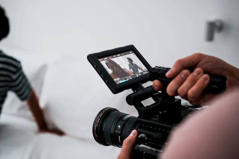 person using video camera